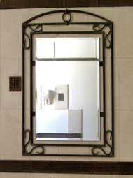 Mirror in the wrought frame